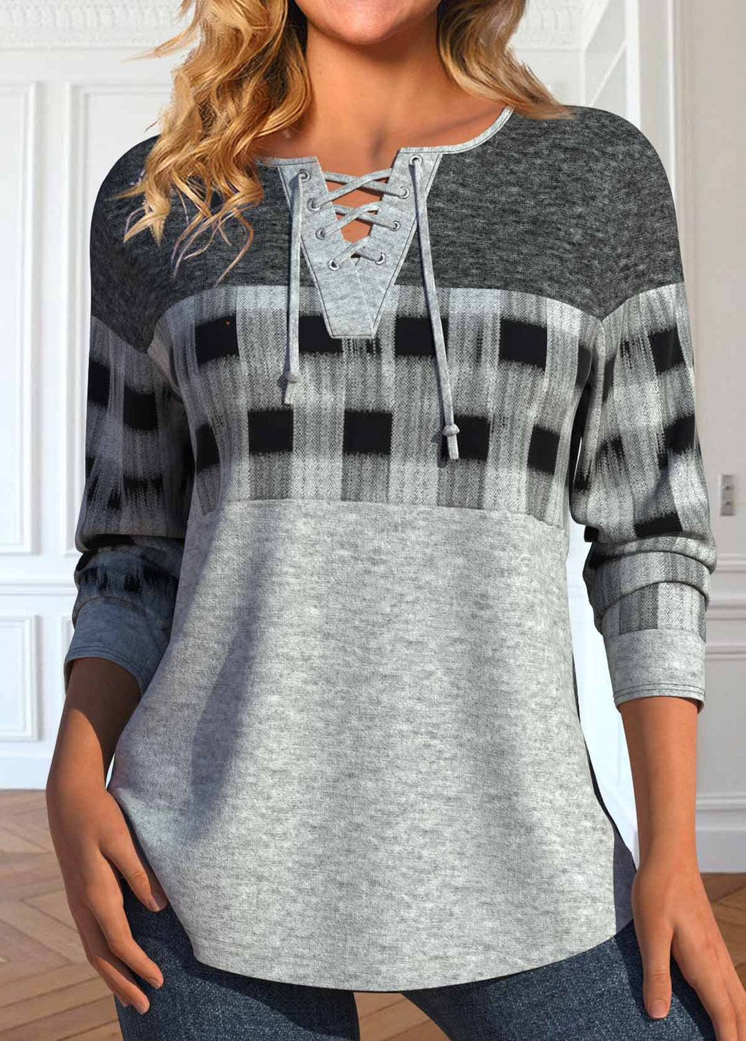 Women’s long-sleeve top in grey with lace-up neckline and black plaid detail