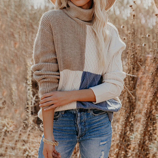 Women’s colour-block turtleneck sweater with cable-knit details in beige, white and blue.