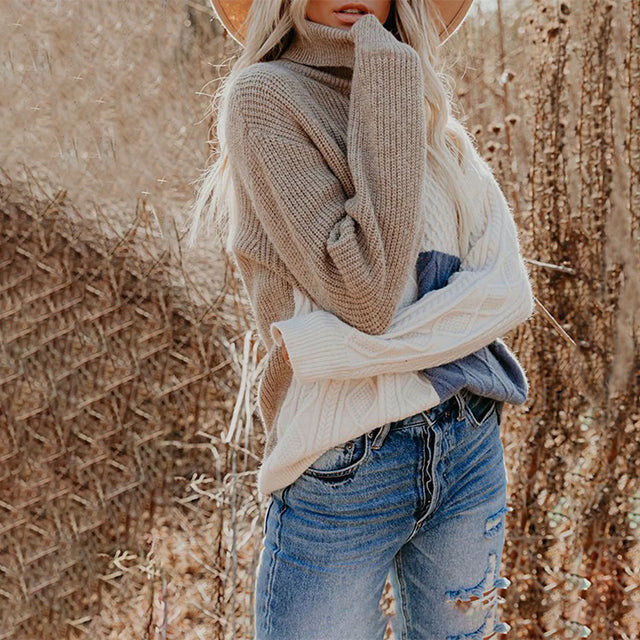 Women’s colour-block turtleneck sweater with textured knit design in beige, white and blue.